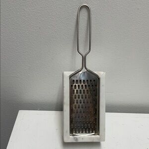 Stainless Steel Cheese Grater with White Marble Base